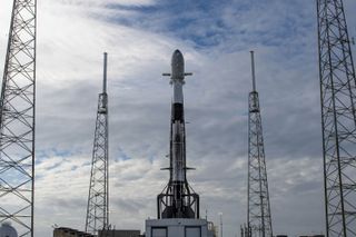 A SpaceX Falcon 9 rocket carrying the COSMO-SkyMed Second Generation FM2 Earth-observation radar satellite for Italy stands atop Space Launch Complex 40 at the Cape Canaveral Space Force Station in Florida. Its launch has been delayed to Jan. 30, 2022.