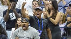 Tiger Woods cheers on Serena Williams at the US Open