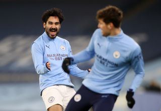 Manchester City’s Ilkay Gundogan warming up prior to kick-off during the Premier League match at the Etihad Stadium, Manchester. Picture date: Tuesday March 2, 2021