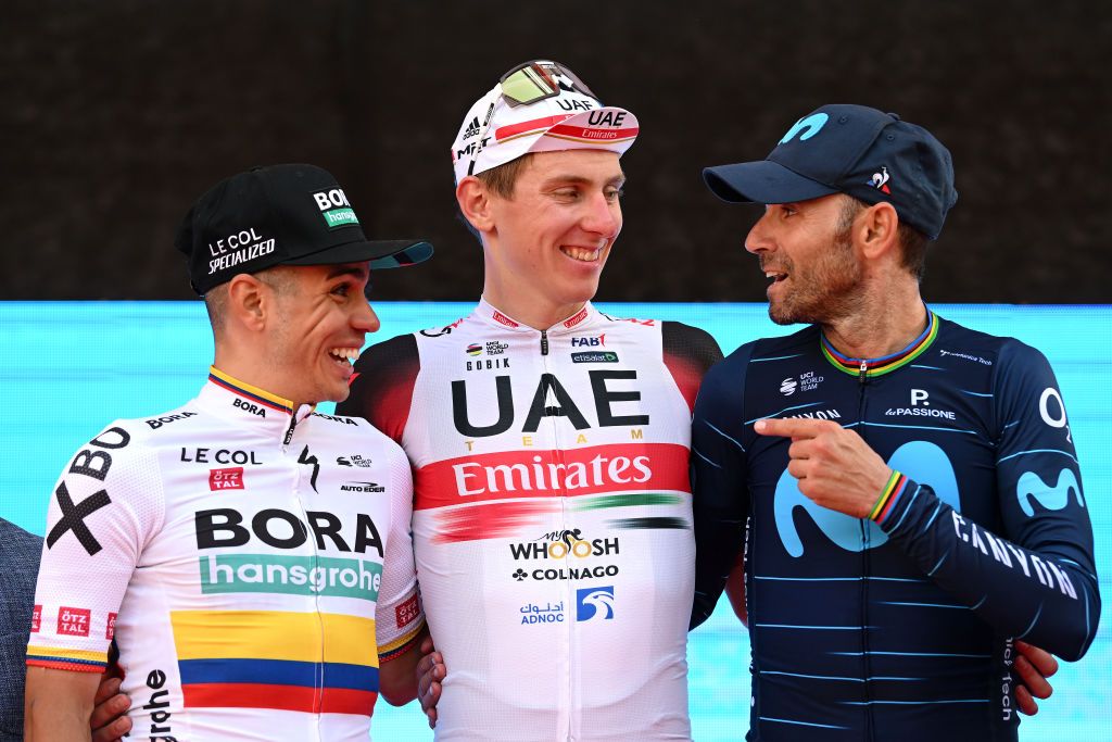 VARESE ITALY OCTOBER 04 LR Sergio Andres Higuita Garcia of Colombia and Bora Hansgrohe Team on second place race winner Tadej Pogacar of Slovenia and UAE Team Emirates and Alejandro Valverde Belmonte of Spain and Movistar Team on third place pose on the podium ceremony after the 101st Tre Valli Varesine 2022 a 1963km one day race from Busto Arsizio to Varese 377m TreValliVaresine on October 04 2022 in Varese Italy Photo by Dario BelingheriGetty Images