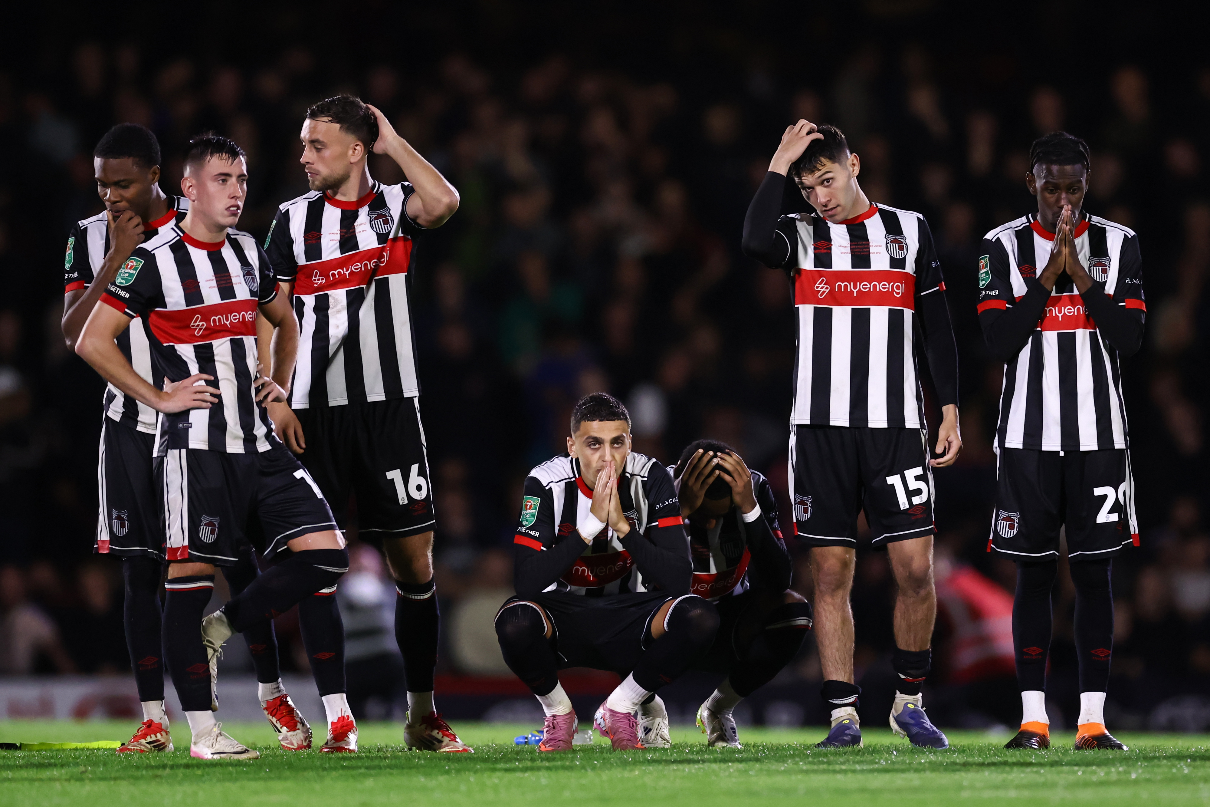 Grimsby players during their 12-11 shootout win over Man United