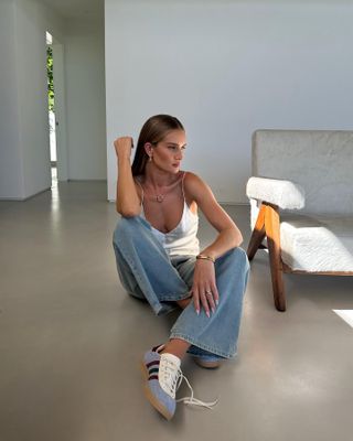 white top and sneakers