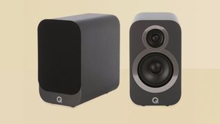 Q Acoustics 3050i 5.1 Cinema Package rear speakers on yellow background