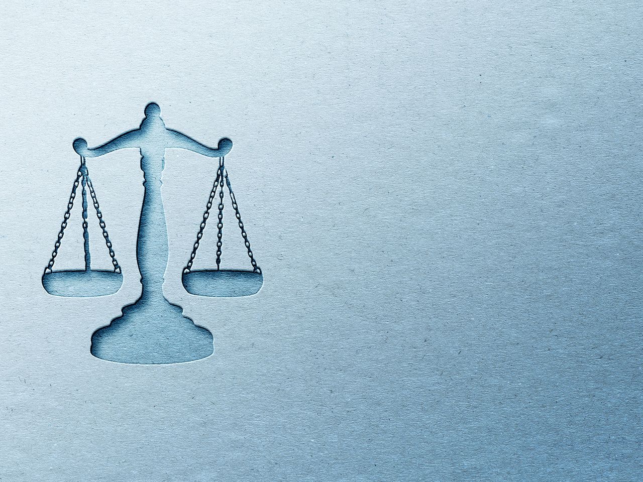 rendering of the scales of justice against a blue background