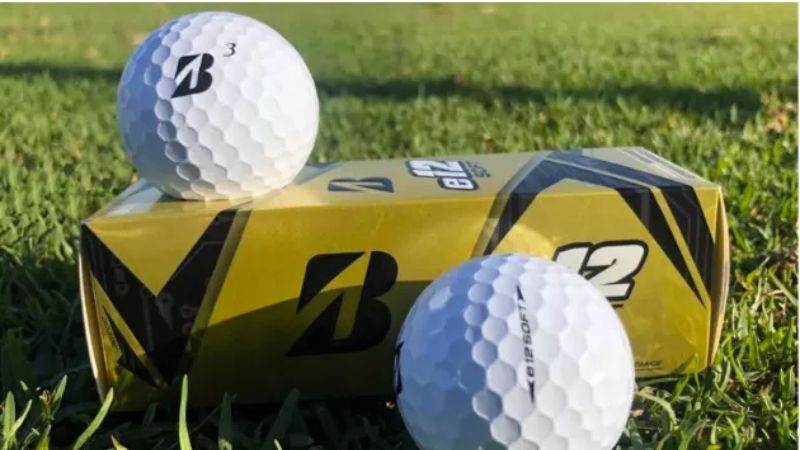 Bridgestone E12 Soft Golf Ball resting on the greens