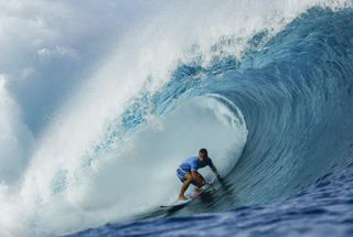 Surfers at the Olympics underwater