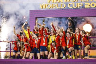 Spain celebrate with the trophy after winning the 2023 Women's World Cup