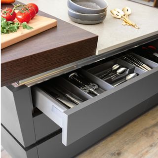 grey kitchen drawer with cutlery tray