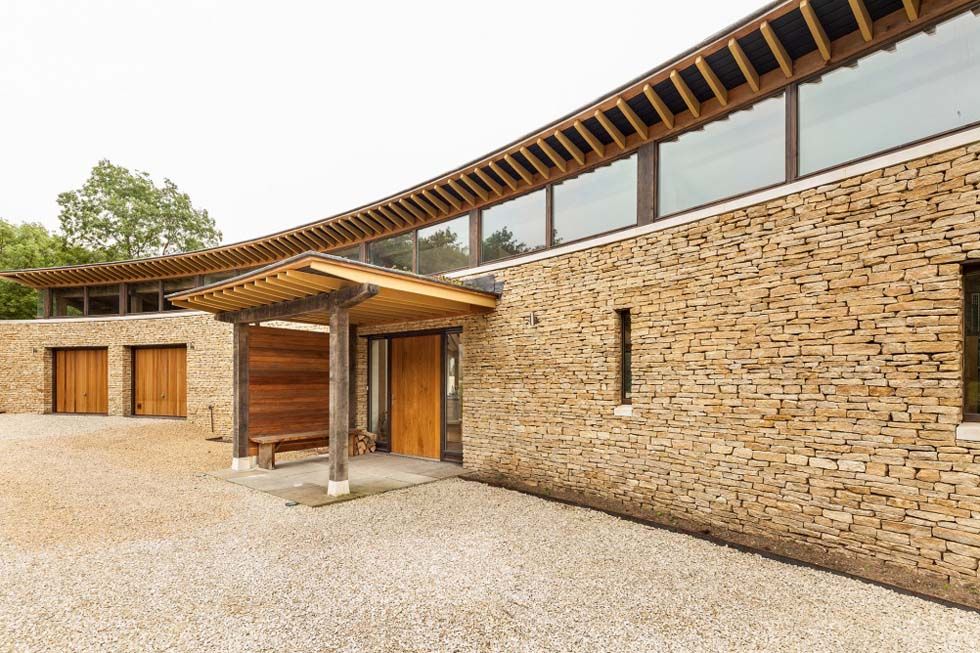 A Curved Oak Frame Home with Striking Entrance