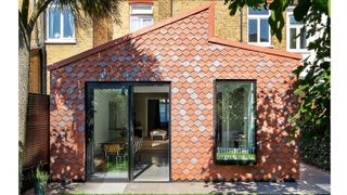 contemporary tile hanging on extension using arrowhead tiles