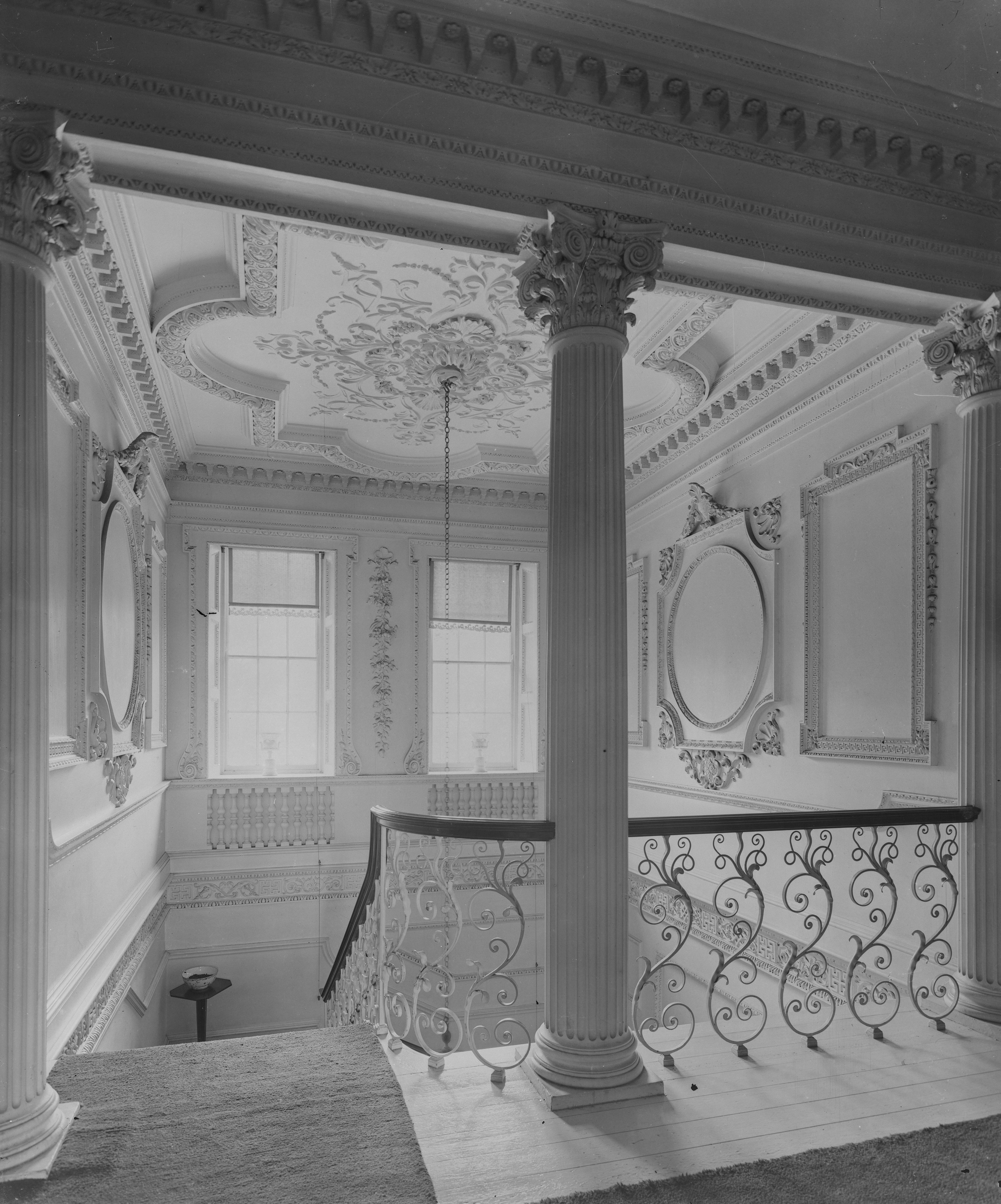 Black and white photographs or a palladian-style house