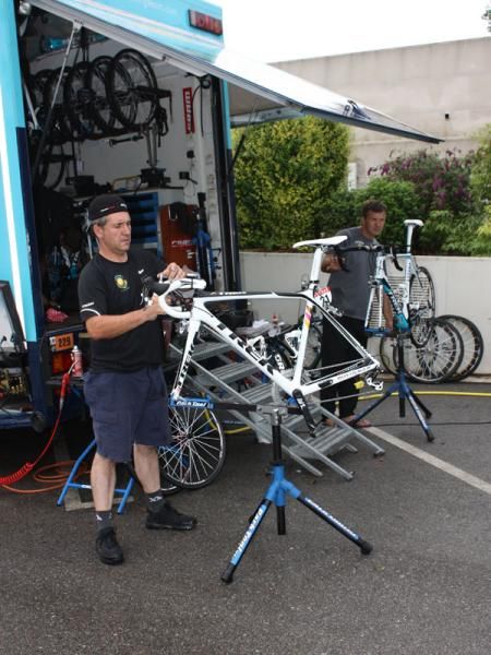 Contador's personal mechanic, Faustino Munoz, readies the 2007 Tour de France champion's bike after the wet stage into Barcelona.