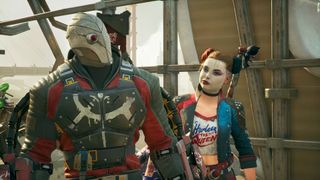 Harley Quinn and Deadshot in Suicide Squad: Kill the Justice League standing on the roof of a building