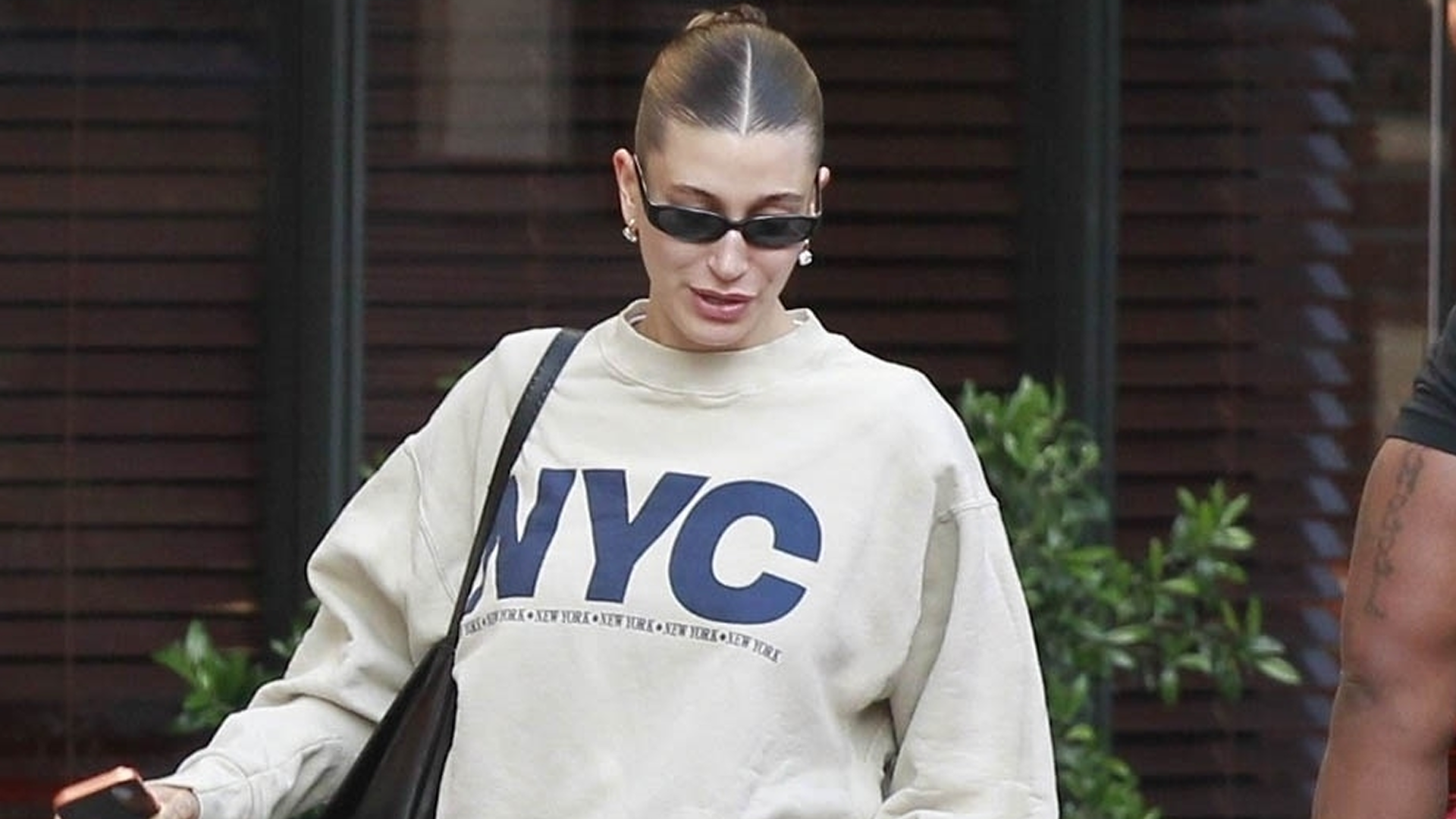 Hailey Bieber traded jeans and sneakers for the straight-leg denim trend and flip-flops