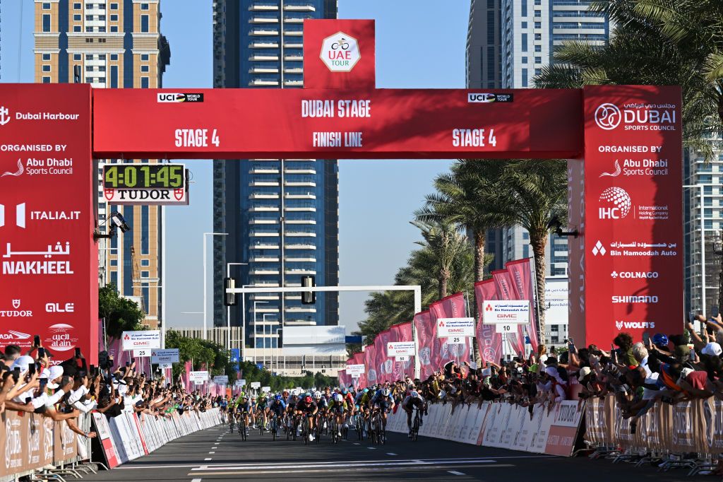 DUBAI HARBOUR DUBAI UNITED ARAB EMIRATES FEBRUARY 22 LR Oded Kogut of Israel and Team IsraelPremier Tech Juan Sebastian Molano of Colombia and Team UAE Emirates Arvid de Klein of The Netherlands and Team Tudor Pro Cycling Jakub Mareczko of Italy and Team CorratecVini Fantini Jarne Van De Paar of Belgium and Team Lotto Dstny Olav Kooij of The Netherlands and Team VismaLease a Bike stage winner Tim Merlier of Belgium and Team SoudalQuick Step and Stanislaw Aniolkowski of Poland and Team Cofidis sprint at finish line during the 6th UAE Tour 2024 Stage 4 a 168km stage from Dubai Police Officers Club to Dubai Harbour UCIWT on February 22 2024 in Dubai United Arab Emirates Photo by Tim de WaeleGetty Images