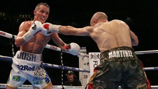 Josh Warrington and Kiko Martinez exchanging punches