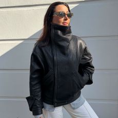 Marina wearing leather jacket