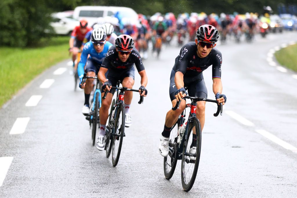 LE GRAND BORNAND FRANCE JULY 03 Richie Porte of Australia Micha Kwiatkowski of Poland and Team INEOS Grenadiers during the 108th Tour de France 2021 Stage 8 a 1508km stage from Oyonnax to Le GrandBornand Rain LeTour TDF2021 on July 03 2021 in Le Grand Bornand France Photo by Michael SteeleGetty Images