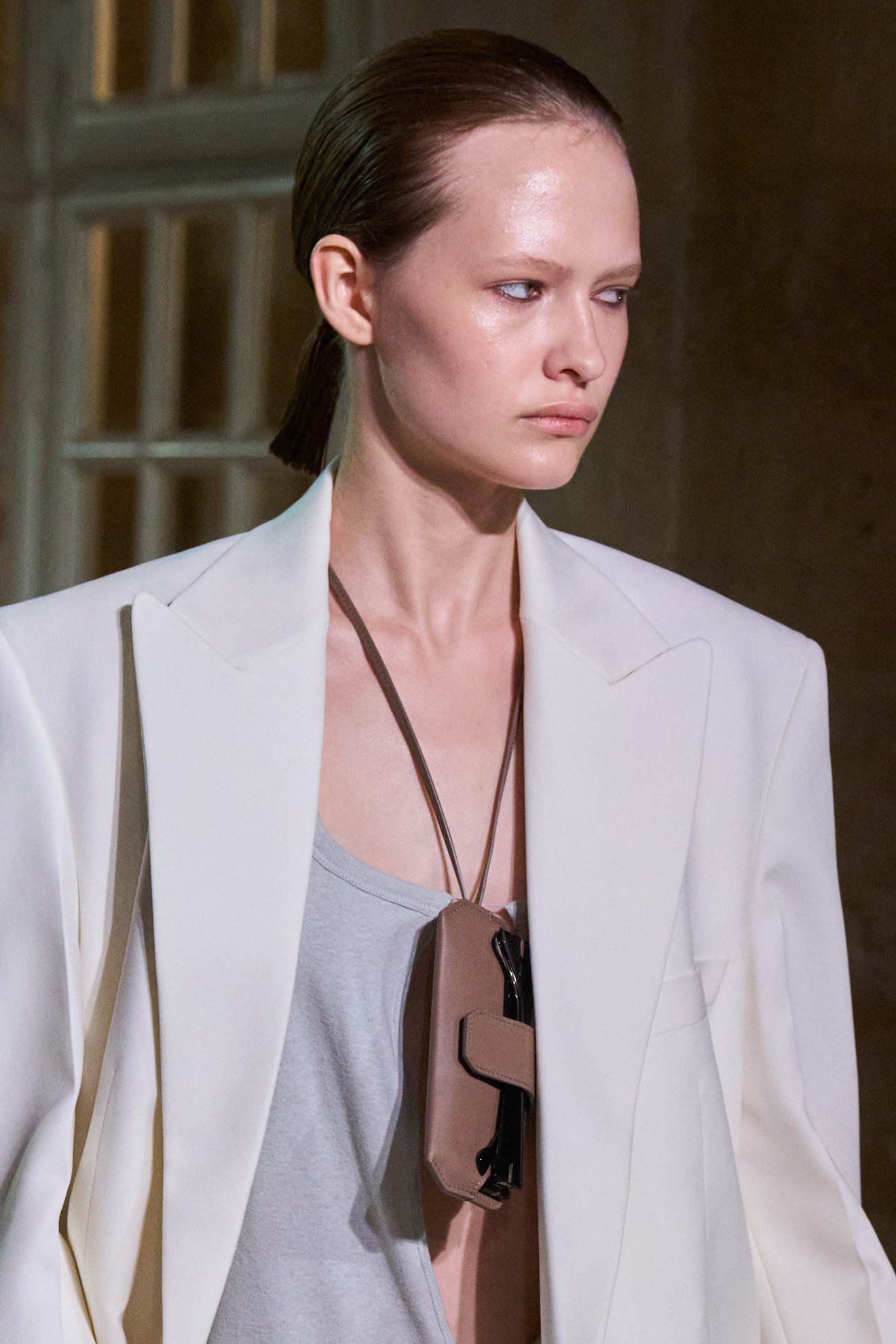 A model wore a corded glasses case around their neck in the Victoria Beckham Spring 2026 show