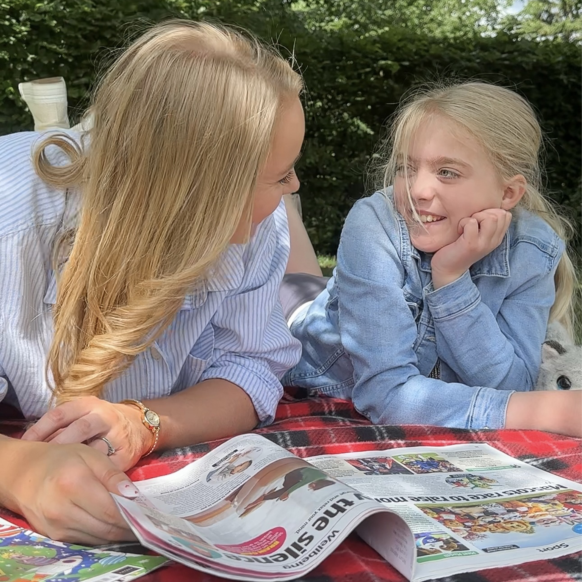 Hanna Williams reading The Week Junior with her daughter