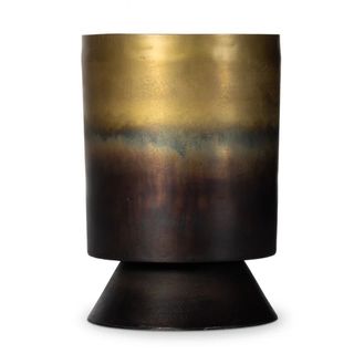 an ombre brass side table