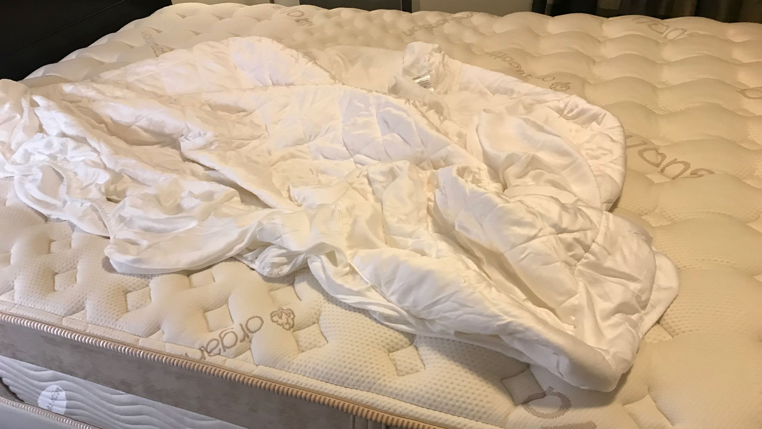 The Nolah Bamboo Mattress Pad on a bed