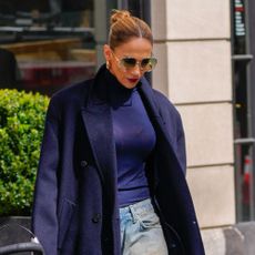Jennifer Lopez wears faux muddy jeans.