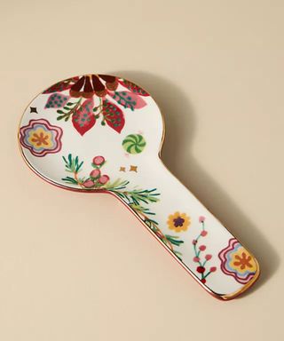 Coco Spoon Rest against a beige background.