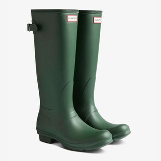 Cutouts of green adjustable Hunter wellington boots on a white background