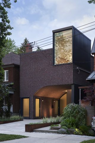 The brick facade fits into the existing streetscape