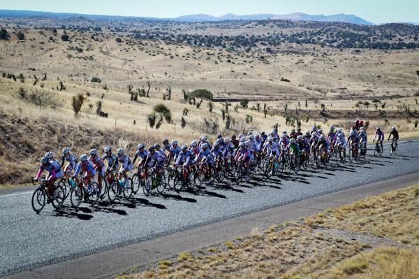 The women still bunched together heading towards the climb.
