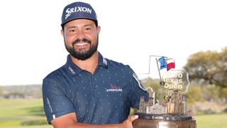 JJ Spaun with the Valero Texas Open trophy