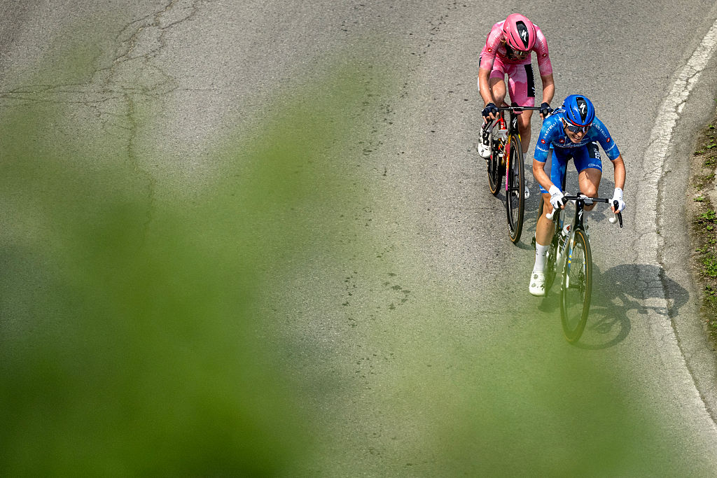 SD Worx Dutch rider Anna Van Der Breggen wearing the overall leader's pink jersey (Maglia Rosa) and FDJ SUEZ Dutch rider Demi Vollering wearing the best climber's blue jersey (Maglia Azzura)