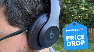 Man wearing Beats Studio Pro headphones