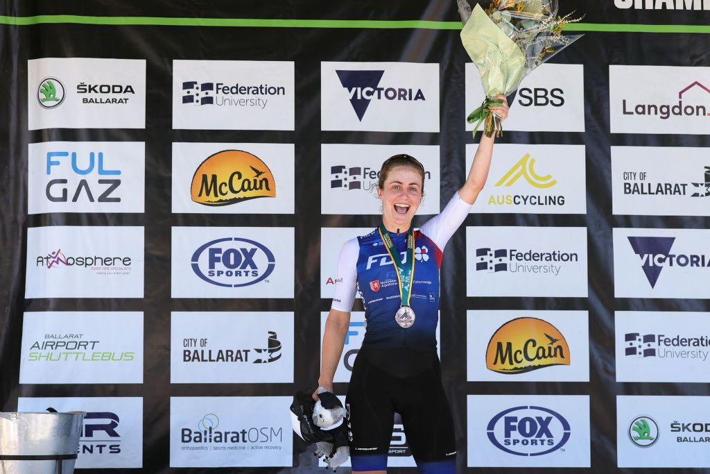 BUNINYONG AUSTRALIA JANUARY 16 LR Grace Brown of Australia on second place poses on the podium ceremony after the Australian Cycling National Championships 2022 Womens U23 and Elite Road Race a 1044km race from Buninyong to Buninyong AusCyclingAus on January 16 2022 in Buninyong Australia Photo by Con ChronisGetty Images