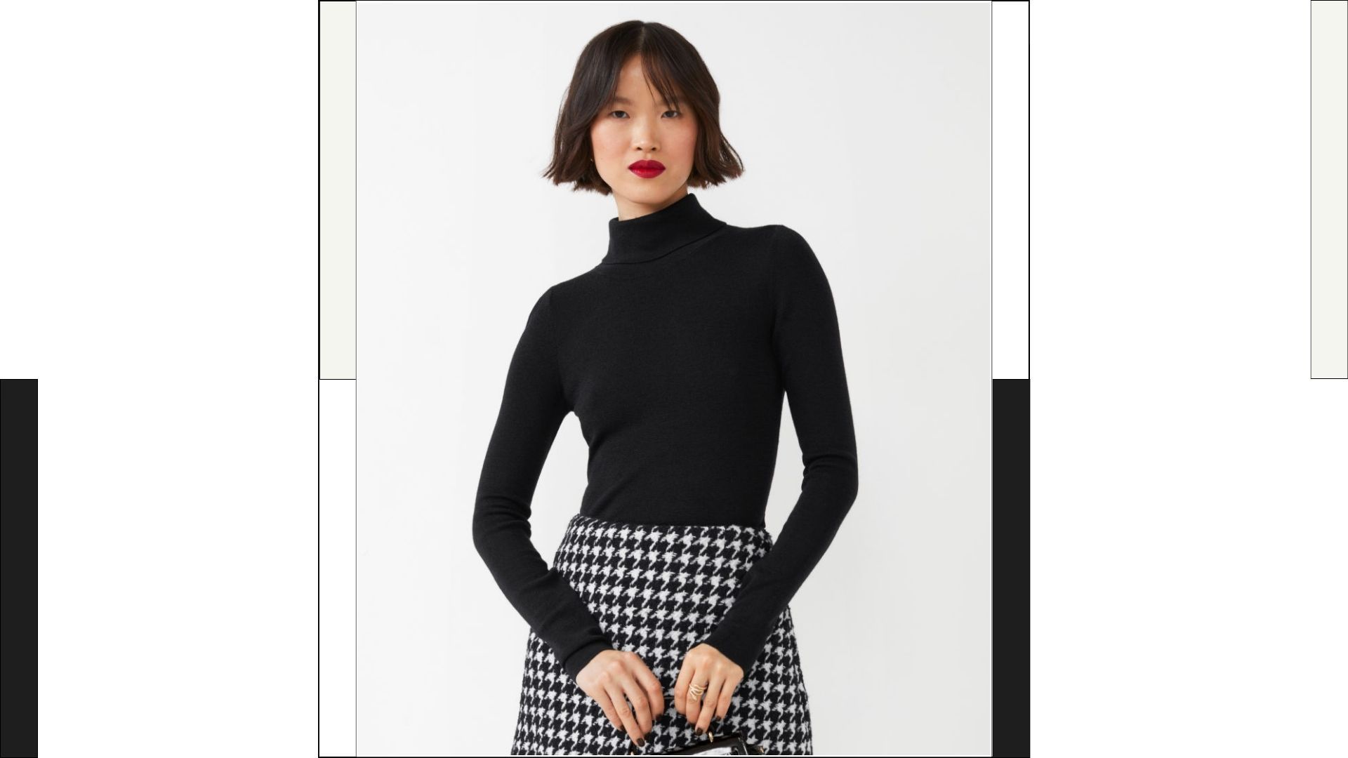 model wore a black Fitted Merino Knit Turtleneck with a black and white plaid mini skirt