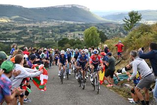 Red jersey Primož Roglič leads the way on Stage 20, 2024.