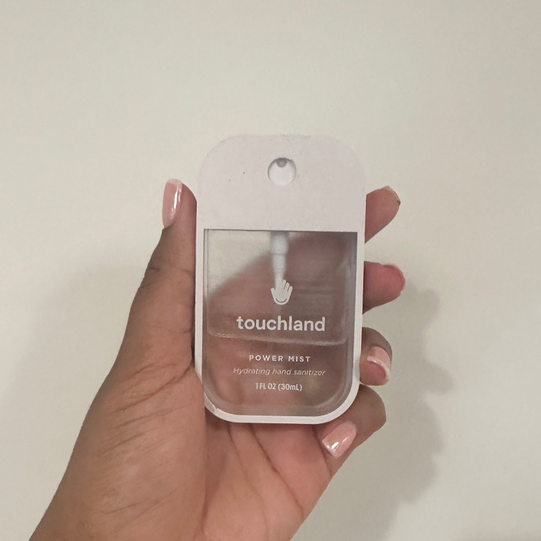 Ariel Baker testing the Touchland Power Mist hand sanitizer