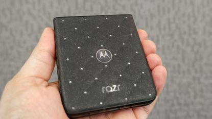 The Motorola Razr with Crystals by Swarovski in hand