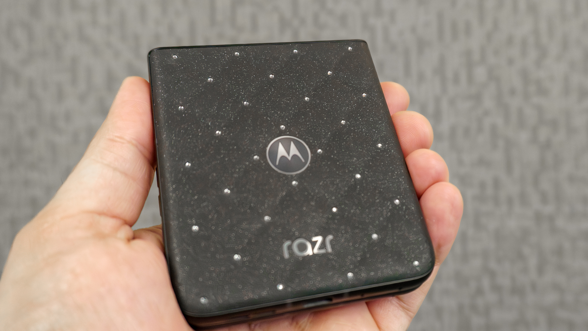The Motorola Razr with Crystals by Swarovski in hand