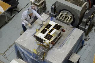 A view of Canada's asteroid-hunting NEOSSat satellite from above. The $25 million satellite is about the size of a suitcase and designed to seek out large asteroids near Earth.