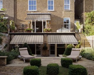 Awnings used to enhane privacy in a shared garden