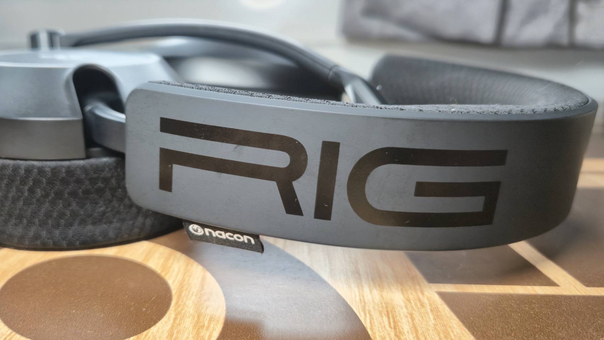 Photo of the headband of the RIG headset. Large &#039;RIG&#039; lettering is printed on top.