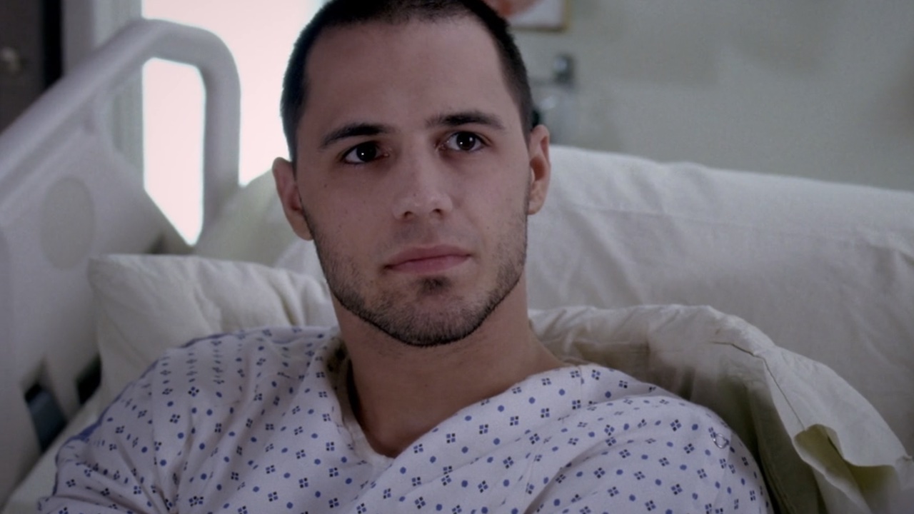 Darren in a hospital bed on Grey's Anatomy