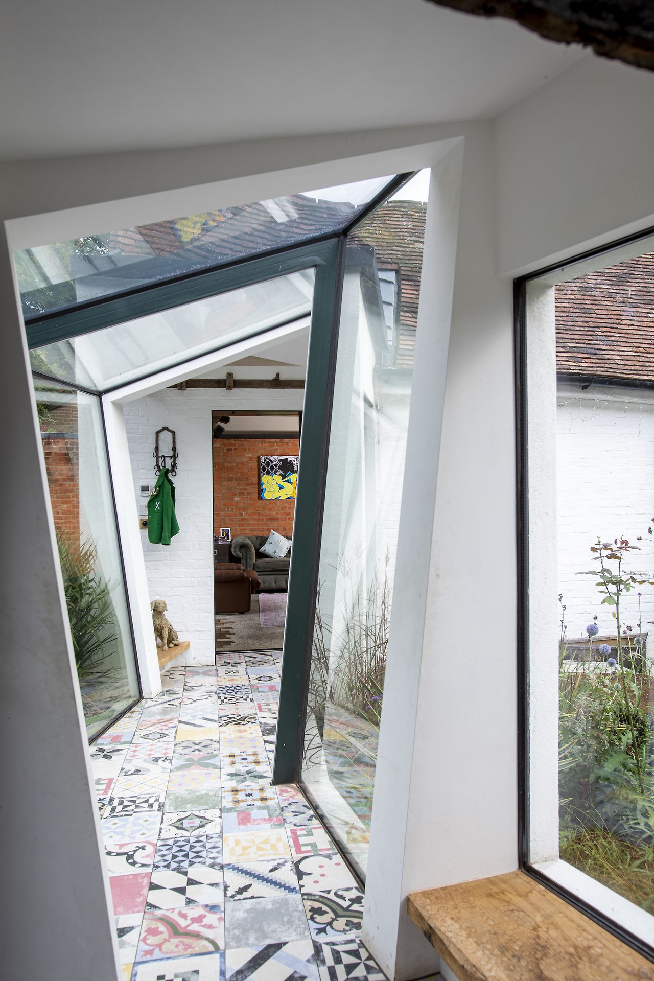 glass link extension corridor to cottage