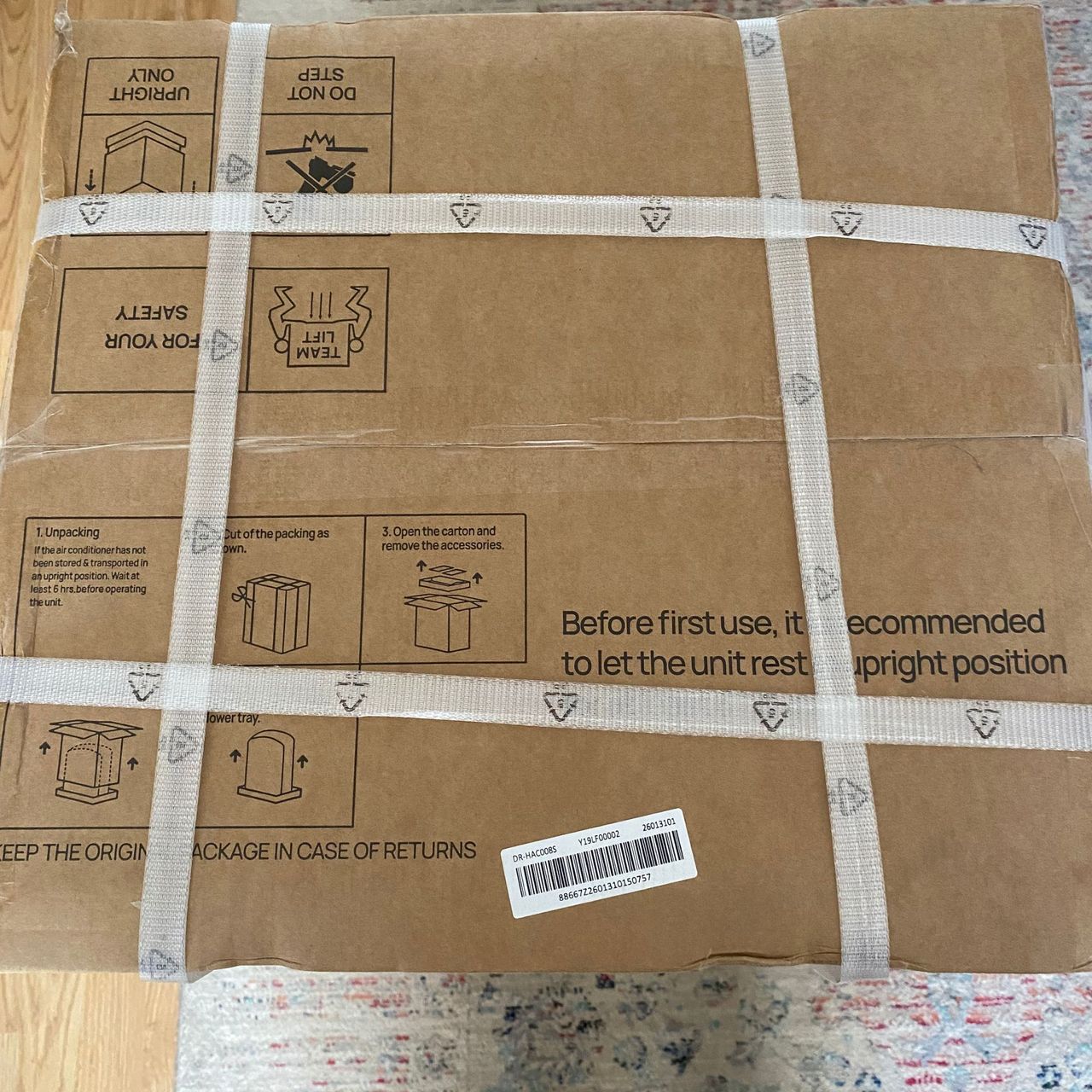 Industrial ties securing the packaging of the Dreo 318s portable air conditioner