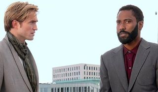 Tenet Robert Pattinson and John David Washington stand apart on the roof