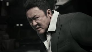 Gang of Dragon trailer still - dude about to get stabbed real bad, he's tough though, he can take it