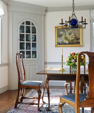Traditional dining room ideas with wooden furniture and white walls