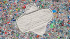 Photo collage of a reusable menstrual pad on a background of microplastic waste